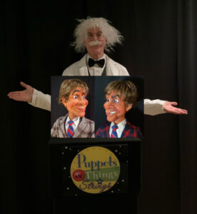 Hellenbach Mark performing his Dr. Hellenbach sketch